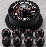 Personalised Korn birthday cake topper with matching cupcake toppers on black cake and cupcakes